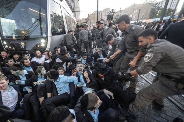 Ultra-Orthodox Jews protest mandatory military service in Jerusalem JERUSALEM - MAY 7: Israeli police use water cannons to disperse Ultra-Orthodox Jewish (Haredi) protesters blocking roads by lying on the ground during a demonstration against the arrest of several yeshiva students over mandatory military service in West Jerusalem on May 7, 2026. Mostafa Alkharouf Anadolu Jerusalem Israel. Editorial use only. Please get in touch for any other usage.  Copyright: x2026xAnadoluxMostafaxAlkharoufx