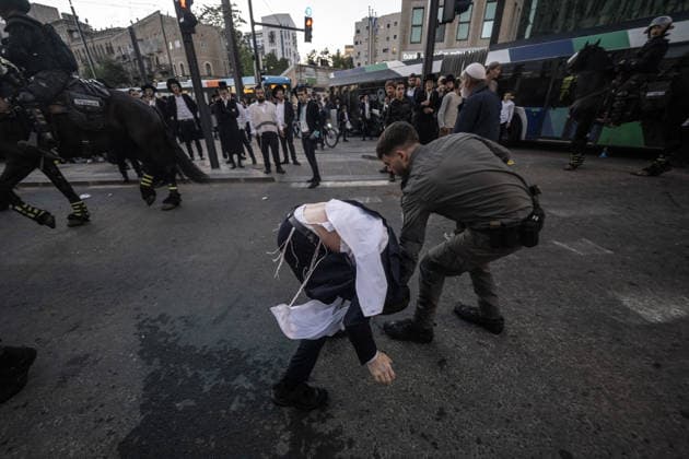 Ultra-Orthodox Jews protest mandatory military service in Jerusalem JERUSALEM - MAY 7: Israeli police use water cannons to disperse Ultra-Orthodox Jewish (Haredi) protesters blocking roads by lying on the ground during a demonstration against the arrest of several yeshiva students over mandatory military service in West Jerusalem on May 7, 2026. Mostafa Alkharouf Anadolu Jerusalem Israel. Editorial use only. Please get in touch for any other usage.  Copyright: x2026xAnadoluxMostafaxAlkharoufx