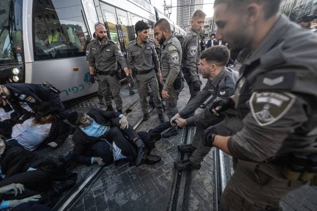 Ultra-Orthodox Jews protest mandatory military service in Jerusalem JERUSALEM - MAY 7: Israeli police use water cannons to disperse Ultra-Orthodox Jewish (Haredi) protesters blocking roads by lying on the ground during a demonstration against the arrest of several yeshiva students over mandatory military service in West Jerusalem on May 7, 2026. Mostafa Alkharouf Anadolu Jerusalem Israel. Editorial use only. Please get in touch for any other usage.  Copyright: x2026xAnadoluxMostafaxAlkharoufx