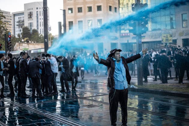 Ultra-Orthodox Jews protest mandatory military service in Jerusalem JERUSALEM - MAY 7: Israeli police use water cannons to disperse Ultra-Orthodox Jewish (Haredi) protesters blocking roads by lying on the ground during a demonstration against the arrest of several yeshiva students over mandatory military service in West Jerusalem on May 7, 2026. Mostafa Alkharouf Anadolu Jerusalem Israel. Editorial use only. Please get in touch for any other usage.  Copyright: x2026xAnadoluxMostafaxAlkharoufx