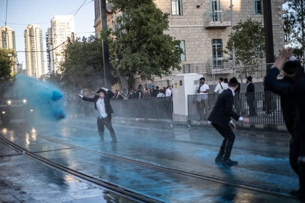 Ultra-Orthodox Jews protest mandatory military service in Jerusalem JERUSALEM - MAY 7: Israeli police use water cannons to disperse Ultra-Orthodox Jewish (Haredi) protesters blocking roads by lying on the ground during a demonstration against the arrest of several yeshiva students over mandatory military service in West Jerusalem on May 7, 2026. Mostafa Alkharouf Anadolu Jerusalem Israel. Editorial use only. Please get in touch for any other usage.  Copyright: x2026xAnadoluxMostafaxAlkharoufx