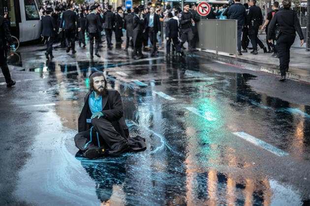 Ultra-Orthodox Jews protest mandatory military service in Jerusalem JERUSALEM - MAY 7: Israeli police use water cannons to disperse Ultra-Orthodox Jewish (Haredi) protesters blocking roads by lying on the ground during a demonstration against the arrest of several yeshiva students over mandatory military service in West Jerusalem on May 7, 2026. Mostafa Alkharouf Anadolu Jerusalem Israel. Editorial use only. Please get in touch for any other usage.  Copyright: x2026xAnadoluxMostafaxAlkharoufx