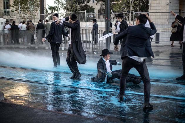 Ultra-Orthodox Jews protest mandatory military service in Jerusalem JERUSALEM - MAY 7: Israeli police use water cannons to disperse Ultra-Orthodox Jewish (Haredi) protesters blocking roads by lying on the ground during a demonstration against the arrest of several yeshiva students over mandatory military service in West Jerusalem on May 7, 2026. Mostafa Alkharouf Anadolu Jerusalem Israel. Editorial use only. Please get in touch for any other usage.  Copyright: x2026xAnadoluxMostafaxAlkharoufx