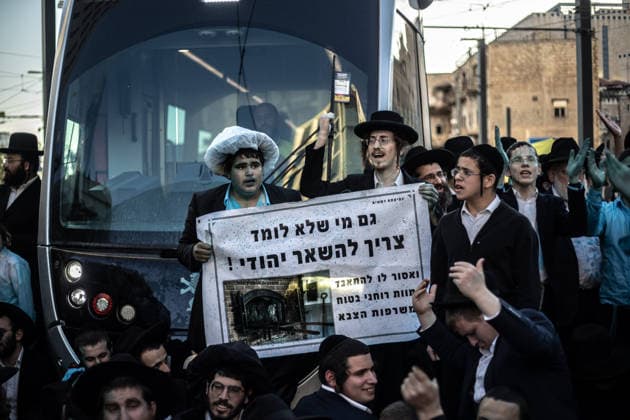 Ultra-Orthodox Jews protest mandatory military service in Jerusalem JERUSALEM - MAY 7: Israeli police use water cannons to disperse Ultra-Orthodox Jewish (Haredi) protesters blocking roads by lying on the ground during a demonstration against the arrest of several yeshiva students over mandatory military service in West Jerusalem on May 7, 2026. Mostafa Alkharouf Anadolu Jerusalem Israel. Editorial use only. Please get in touch for any other usage.  Copyright: x2026xAnadoluxMostafaxAlkharoufx