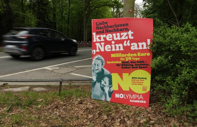 A poster from the NOlympia Hamburg alliance, which is campaigning against Hamburgs bid to host the Olympic Games, was attached to a lamppost in Hamburgs Stadtpark Winterhude Hamburg