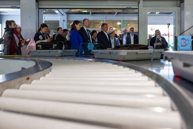 Opening of the new CT checkpoint at Nuremberg Airport, Nuremberg, 08 05 2026 Participants at the press event take a tour of the new CT checkpoint at Nuremberg Airport In the foreground is conveyor technology for passenger screening Nuremberg Bavaria Germany 20260508-286A6872-M4000