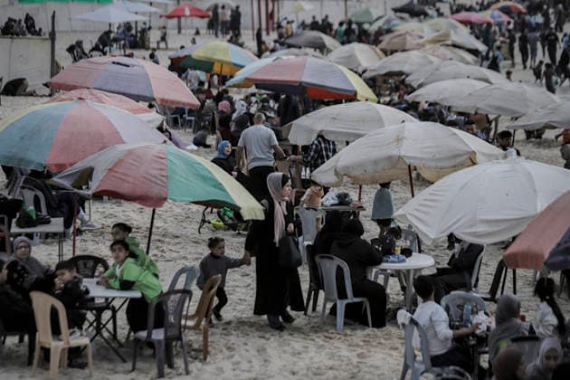 Gaza Beach Displaced Palestinians Daily Displaced Palestinians spend their leisure time on a beach lined with tents in Gaza City on May 8, 2026. The seaside area has become a refuge for displaced families amid the ongoing humanitarian crisis in the Gaza Strip. Gaza Gaza Strip Palestinian Territories Copyright: xAhmedxAlxArinix