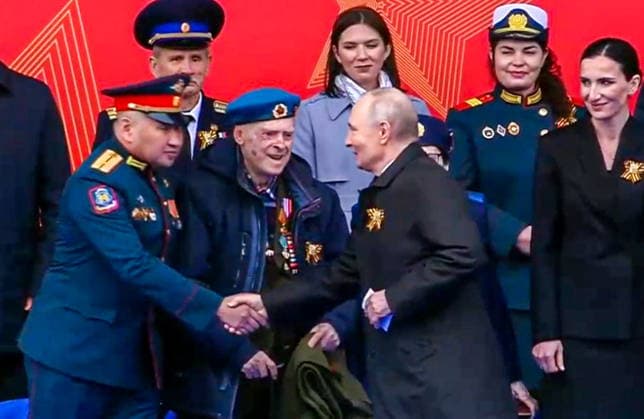 RUSSIA, MOSCOW - MAY 9, 2026: Vladimir Putin (R front), President of Russia, emerges ahead of a military parade in Red Square on Victory Day to mark 81 years since the victory of the Soviet Union over Nazi Germany in the Great Patriotic War, Eastern Front of World War II. Video screen grab. Best quality available. TASS  92218829