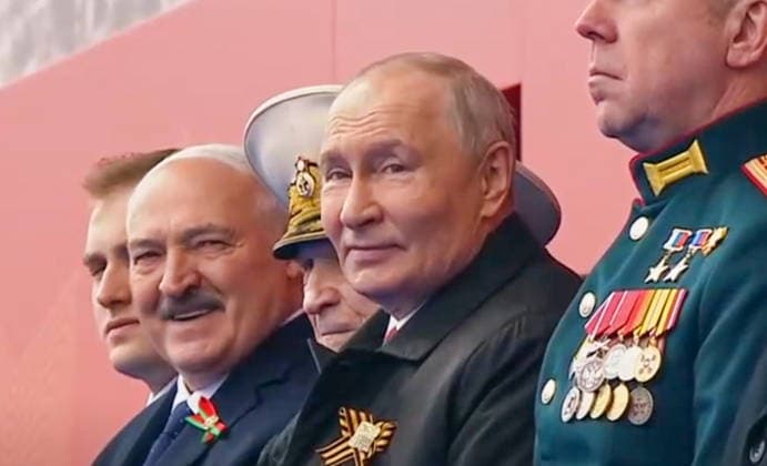 RUSSIA, MOSCOW - MAY 9, 2026: Vladimir Putin (2nd R), President of Russia, and his counterpart Alexander Lukashenko (2nd L) of Belarus attend a military parade in Red Square on Victory Day to mark 81 years since the victory of the Soviet Union over Nazi Germany in the Great Patriotic War, Eastern Front of World War II. Video screen grab. Best quality available. TASS  92218892