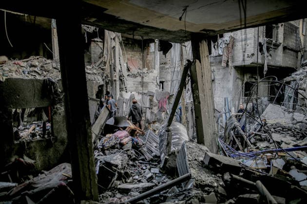 Destruction in Al-Shati Camp following Israeli airstrike in Gaza GAZA CITY, GAZA, PALESTINE - MAY 09: Palestinians inspect the extensive damage at buildings following an Israeli air strike on the Al-Shati Camp violating the current ceasefire agreement in western Gaza City, Gaza, Palestine on May 09, 2026. Palestinian families returned to the site of the blast to search through the rubble for their belongings and assess the scale of the destruction. Saeed M. M. T. Jaras Anadolu Gaza City Gaza. Editorial use only. Please get in touch for any other usage.  Copyright: x2026xAnadoluxSaeedxM.xM.xT.xJarasx