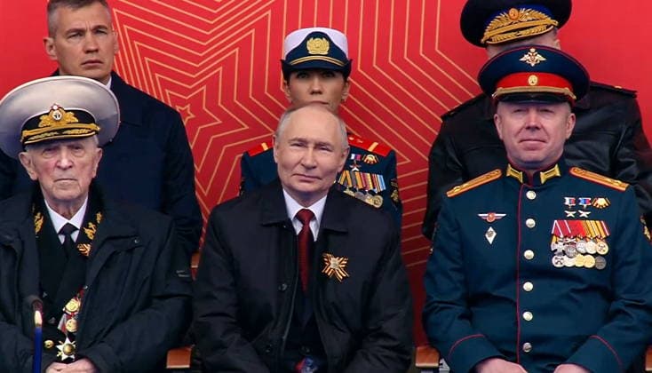 RUSSIA, MOSCOW - MAY 9, 2026: Vladimir Putin (C), President of Russia, attends a military parade in Red Square on Victory Day to mark 81 years since the victory of the Soviet Union over Nazi Germany in the Great Patriotic War, Eastern Front of World War II. Video screen grab. Best quality available. TASS  92219148