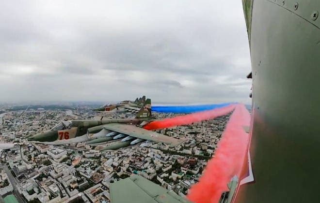 RUSSIA, MOSCOW - MAY 9, 2026: Sukhoi Su-25 attack aircraft take part in a military parade over Red Square on Victory Day to mark 81 years since the victory of the Soviet Union over Nazi Germany in the Great Patriotic War, Eastern Front of World War II. Video screen grab. Best quality available. TASS  92219165