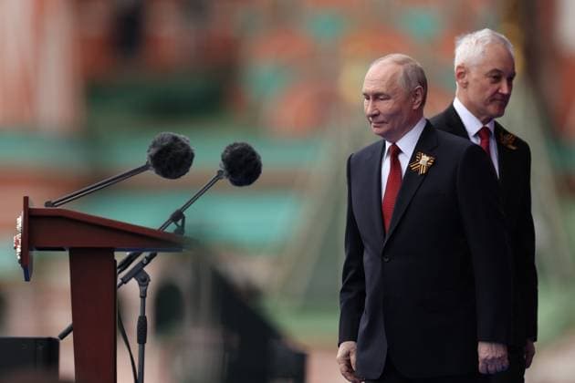 Russia WWII Victory Day Parade 9160548 09.05.2026 Russian President Vladimir Putin and Defence Minister Andrei Belousov attend a military parade on Victory Day, marking the 81st anniversary of the victory over Nazi Germany in World War Two, in Red Square, in Moscow, Russia. Alexander Shcherbak Sputnik Moscow Russia  Copyright: xAlexanderxShcherbakx