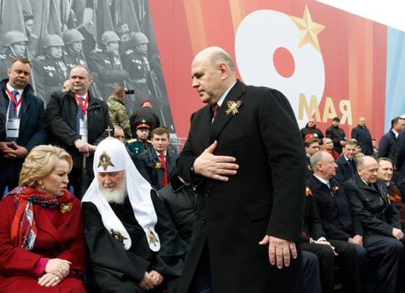 Russia WWII Victory Day Parade 9160565 09.05.2026 Russian Prime Minister Mikhail Mishustin passes by Federation Council Speaker Valentina Matvienko and Patriarch Kirill of Moscow and all Russia before a military parade on Victory Day, marking the 81st anniversary of the victory over Nazi Germany in World War Two, in Red Square, in Moscow, Russia. Dmitry Astakhov Sputnik Moscow Russia  Copyright: xDmitryxAstakhovx
