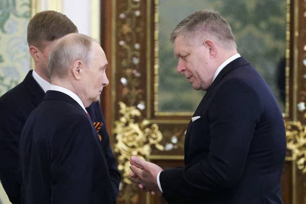 RUSSIA, MOSCOW - MAY 9, 2026: Russia s President Vladimir Putin (L) and Slovakia s Prime Minister Robert Fico chat ahead of a meeting at Moscow s Kremlin on Victory Day. Sergei Karpukhin TASS  92224091
