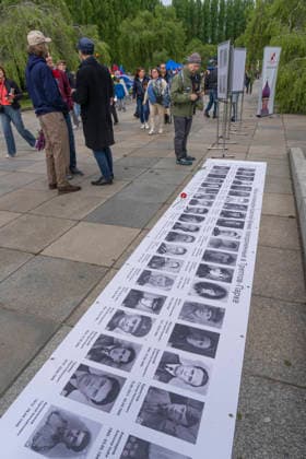 Photos of fallen Soviet soldiers on May 9, Victory Day, at the Soviet Memorial in Treptower Park in Berlin Treptow