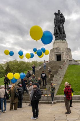 Protest with balloons in the national colors of Ukraine against Russias war in Ukraine on May 9, Victory Day, at the Soviet Memorial in Treptower Park in Berlin Treptow