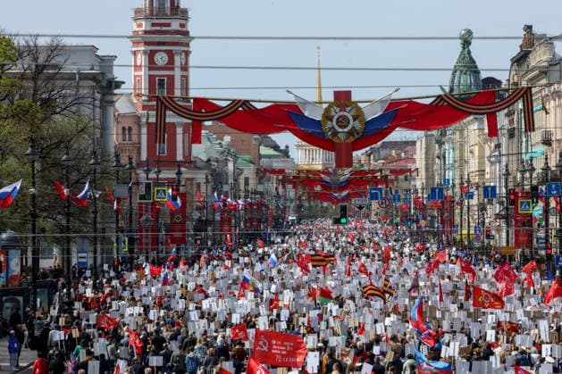 RUSSIA, ST PETERSBURG - MAY 9, 2026: People hold portraits of their relatives who fought in World War II as they take part in an Immortal Regiment event on Victory Day. Peter Kovalev TASS  92225163