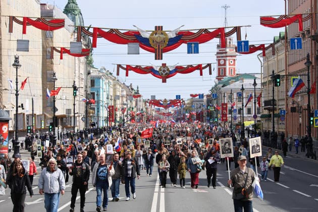 RUSSIA, ST PETERSBURG - MAY 9, 2026: People hold portraits of their relatives who fought in World War II as they take part in an Immortal Regiment event on Victory Day. Valentin Yegorshin TASS  92224844