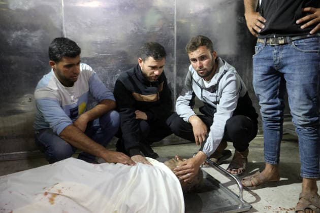 Palestinians mourn man killed in Gaza City strike Palestinians mourn over the body of a man at Al-Shifa Hospital in Gaza City on May 09, 2026. According to reports, the man was killed after an Israeli army drone targeted an electric bicycle he was riding north of Gaza City. Photo by Belal Osama apaimages Gaza Gaza Strip Palestinian Territory 090526_Gaza_bS_1_00(9) Copyright: xapaimagesxBelalxOsamax xapaimagesx
