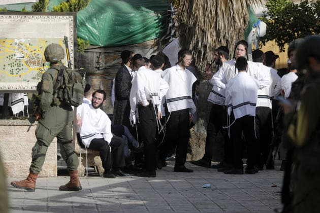 Israeli illegal settlers escorted by security forces raid Hebron s Old City in West Bank WEST BANK, PALESTINE - MAY 09: Israeli settlers raid the Old City of Hebron under the protection of Israeli security forces in the southern West Bank, Palestine on May 09, 2026. Israeli forces implement extensive security measures during the incursion and restrict the movement of Palestinian residents in the area. The presence of armed soldiers ensures the settlers passage through the historic district while local activity remains heavily controlled Mamoun Wazwaz Anadolu West Bank Palestine. Editorial use only. Please get in touch for any other usage.  Copyright: x2026xAnadoluxMamounxWazwazx