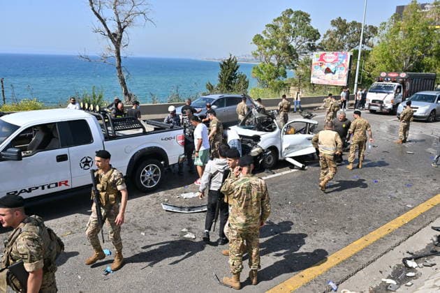 Israeli airstrike targets vehicle on Beirut-Sidon Highway in Lebanon BEIRUT, LEBANON - MAY 09: Lebanese security forces and emergency teams work at the scene after an Israeli air strike targeted a moving vehicle on the Beirut-Sidon highway on May 09, 2026. Reports indicate that two people lost their lives and two others sustained injuries in the attack. The targeted vehicle remains completely destroyed as security personnel cordons off the area following the strike. Houssam Shbaro Anadolu Beirut Lebanon. Editorial use only. Please get in touch for any other usage.  Copyright: x2026xAnadoluxHoussamxShbarox