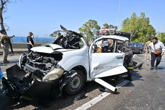 Israeli airstrike targets vehicle on Beirut-Sidon Highway in Lebanon BEIRUT, LEBANON - MAY 09: Lebanese security forces and emergency teams work at the scene after an Israeli air strike targeted a moving vehicle on the Beirut-Sidon highway on May 09, 2026. Reports indicate that two people lost their lives and two others sustained injuries in the attack. The targeted vehicle remains completely destroyed as security personnel cordons off the area following the strike. Houssam Shbaro Anadolu Beirut Lebanon. Editorial use only. Please get in touch for any other usage.  Copyright: x2026xAnadoluxHoussamxShbarox