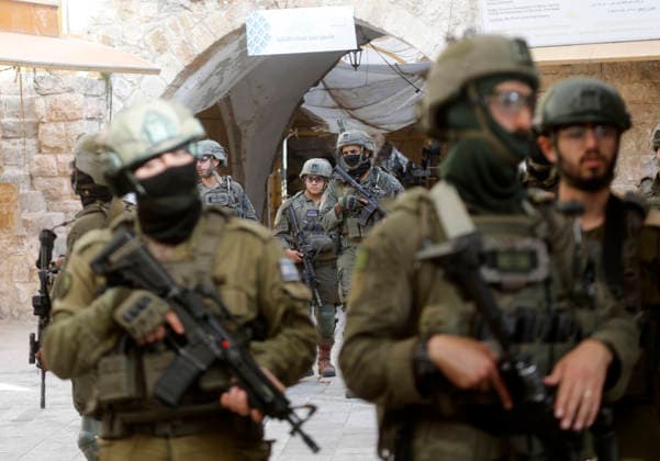 Israeli forces escort settlers through Hebron’s Old City Israeli forces patrol the Old City of Hebron in the occupied West Bank on May 09, 2026, during a tour by Israeli settlers through the area’s narrow alleys and old markets. The heavy deployment disrupted commercial activity and restricted the movement of Palestinian residents, as shops closed and streets emptied during the operation. Photo by Mamoun Wazwaz apaimages Hebron West Bank Palestinian Territory 090526_Hebron_MW_00(10) Copyright: xapaimagesxMamounxWazwazx xapaimagesx