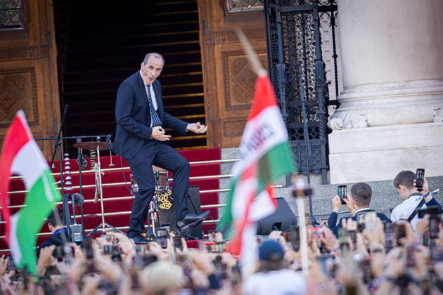 May 9, 2026, Budapest, Hungary: Zsolt Hegedus dances to music on the steps of the Parliament building in Budapest following the inauguration ceremony of Peter Magyar Budapest Hungary  - ZUMAl194 20260509_zip_l194_056 Copyright: xMarekxLadzinskix