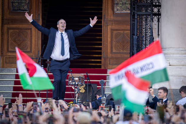 May 9, 2026, Budapest, Hungary: Zsolt Hegedus dances to music on the steps of the Parliament building in Budapest following the inauguration ceremony of Peter Magyar Budapest Hungary - ZUMAl194 20260509_zip_l194_055 Copyright: xMarekxLadzinskix