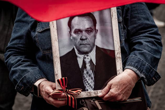May 9, 2026, Barcelona, Spain: A participant holds a portrait of a Soviet veteran during an Immortal Regiment gathering in Barcelona marking Victory Day, the annual commemoration of the Soviet Union s victory over Nazi Germany in World War II. Barcelona Spain - ZUMAb137 20260509_fap_b137_019 Copyright: xJordixBoixareux