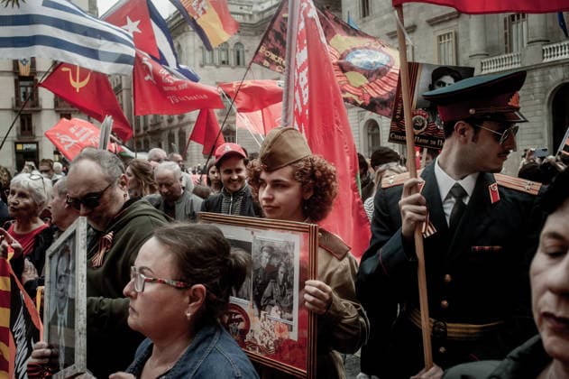 May 9, 2026, Barcelona, Spain: Participants carry portraits of Soviet soldiers and wave communist flags during an Immortal Regiment march in Barcelona marking Victory Day, the annual commemoration of the Soviet Union s victory over Nazi Germany in World War II. Barcelona Spain - ZUMAb137 20260509_fap_b137_023 Copyright: xJordixBoixareux