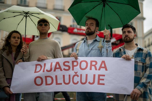 May 9, 2026, Madrid, Spain: Protesters carry a banner during the demonstration. During a gathering of Serbian residents in Madrid s Puerta del Sol as part of the global action The Diaspora Decides, STUDENTS WIN! to alert the international community to the deep institutional and democratic crisis in Serbia. The slogan Students Win! (Studenti pobedili) has become a rallying cry for youth groups demanding a review of democratic transparency in the country. Madrid Spain - ZUMAs197 20260509_aaa_s197_067 Copyright: xDavidxCanalesx