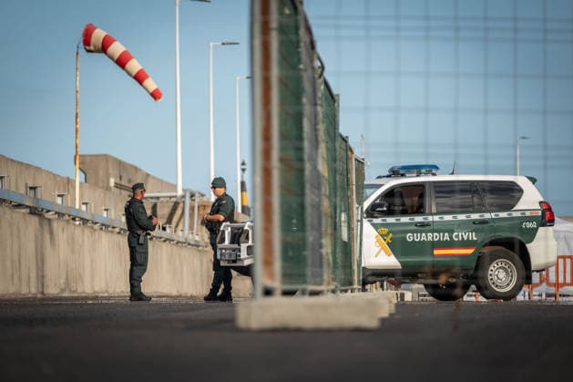 Preparations are underway at Granadilla Port for MV Hondius TENERIFE, CANARY ISLANDS, SPAIN - MAY 09: Officers from the Spanish Civil Guard’s Special Reserve Group (GRS) secure the entrance to the Port of Granadilla ahead of the arrival of the MV Hondius to the island of Tenerife at Granadilla port, Tenerife, Canary Islands, Spain on May 09, 2026. Andres Gutierrez Anadolu Tenerife Spain. Editorial use only. Please get in touch for any other usage.  Copyright: x2026xAnadoluxAndresxGutierrezx