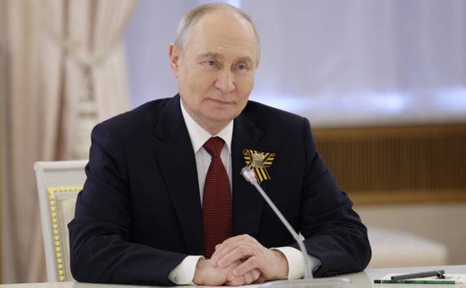 May 9, 2026, Moscow, Moscow Oblast, Russia: Russian President Vladimir Putin, listens to Laos President Thongloun Sisoulith, during a bilateral meeting following the Victory Day parade at the Grand Kremlin Palace, May 9, 2026 in Moscow, Russia. The annual event marked the 81st anniversary of the victory over Nazi Germany in World War Two. Moscow Russia - ZUMAp138 20260509_zaa_p138_071 Copyright: xKremlinxPool RussianxGovernmentx