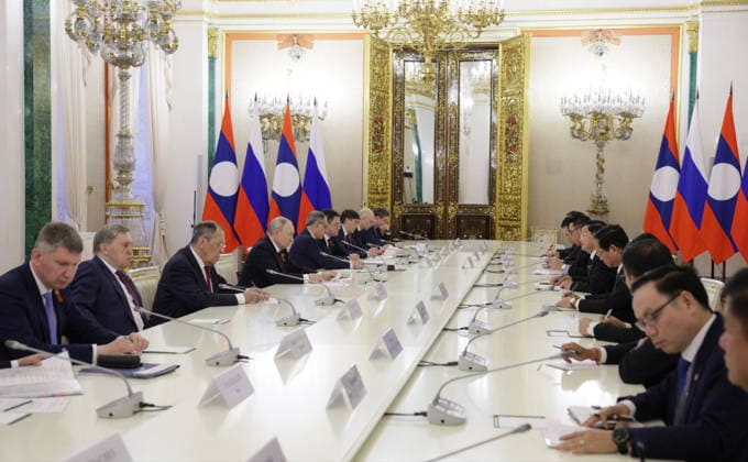 May 9, 2026, Moscow, Moscow Oblast, Russia: Russian President Vladimir Putin, left, listens to Laos President Thongloun Sisoulith, right, during an expanded bilateral meeting following the Victory Day parade at the Grand Kremlin Palace, May 9, 2026 in Moscow, Russia. The annual event marked the 81st anniversary of the victory over Nazi Germany in World War Two. Moscow Russia - ZUMAp138 20260509_zaa_p138_075 Copyright: xKremlinxPool RussianxGovernmentx