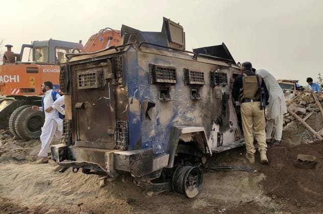 (260510) -- BANNU, May 10, 2026 -- A destroyed police armored vehicle is seen at the site of a suicide attack in Bannu district, Khyber Pakhtunkhwa province, Pakistan, May 10, 2026. At least 12 police personnel were killed and several others injured after a suicide bomber rammed an explosive-laden vehicle into a police installation in Pakistan s northwestern Khyber Pakhtunkhwa province, official sources said on Sunday. (Str Xinhua) (SpotNews) PAKISTAN-BANNU-POLICE INSTALLATION-SUICIDE ATTACK-AFTERMATH AhmadxKamal 