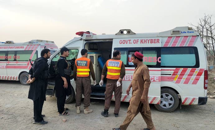 (260510) -- BANNU, May 10, 2026 -- Ambulances are seen at the site of a suicide attack in Bannu district, Khyber Pakhtunkhwa province, Pakistan, May 10, 2026. At least 12 police personnel were killed and several others injured after a suicide bomber rammed an explosive-laden vehicle into a police installation in Pakistan s northwestern Khyber Pakhtunkhwa province, official sources said on Sunday. (Str Xinhua) (SpotNews) PAKISTAN-BANNU-POLICE INSTALLATION-SUICIDE ATTACK-AFTERMATH AhmadxKamal 