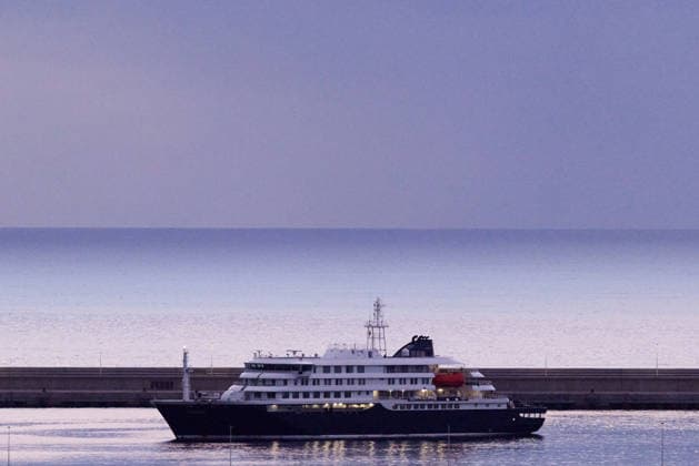 (260510) -- TENERIFE, May 10, 2026 -- This photo taken on May 10, 2026 shows the hantavirus-hit cruise ship MV Hondius at the Port of Granadilla on the island of Tenerife in Spain. Spanish authorities launched an operation on Sunday to evacuate and transfer all passengers and part of the crew aboard the hantavirus-hit cruise ship MV Hondius. Earlier, the vessel anchored off the Port of Granadilla on the Spanish island of Tenerife. The operation is expected to continue through Sunday and Monday. ) FOCUS Spanish authorities evacuate hantavirus-hit cruise ship off Tenerife MengxDingbo 