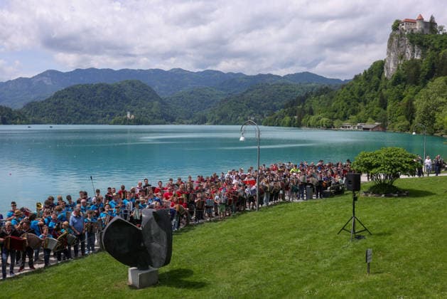 (260510) -- BLED, May 10, 2026 -- Participants play the accordion during the accordion weekend event at Lake Bled in Bled, Slovenia, May 10, 2026. This annual event brings together hundreds of participants for band performances, ensemble shows and an accordion procession. (Photo by Xinhua) SLOVENIA-BLED-ACCORDION WEEKEND ZeljkoxStevanic 