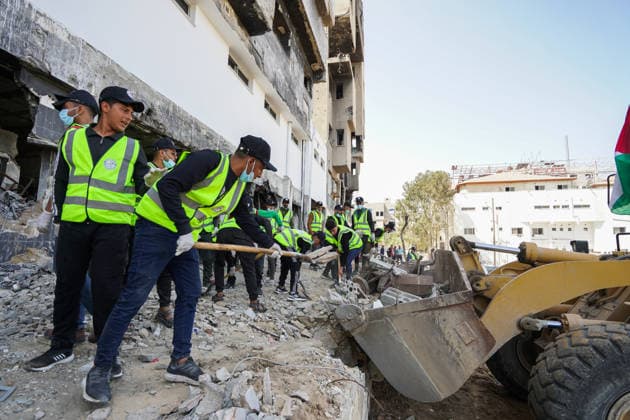 Volunteers clear rubble at al-Shifa Hospital in Gaza City Palestinian volunteers take part in removing rubble and cleaning the outer courtyard of al-Shifa Hospital in Gaza City on May 10, 2026, as part of the Volunteer Work Week activities organized by the Operation Chivalrous Knight 3 initiative. The campaign included cleaning works, rubble removal, tree planting and the installation of shade structures for residents around the hospital. Photo by Ramzi Abu Amer apaimages Khan Yunis Gaza Strip Palestinian Territory 100526_Gaza_RA_00(20).jpeg Copyright: xapaimagesxRamzixxAbuxAmerx xapaimagesx