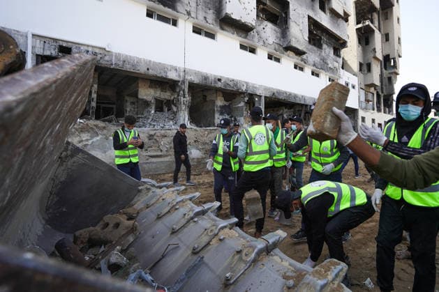 Volunteers clear rubble at al-Shifa Hospital in Gaza City Palestinian volunteers take part in removing rubble and cleaning the outer courtyard of al-Shifa Hospital in Gaza City on May 10, 2026, as part of the Volunteer Work Week activities organized by the Operation Chivalrous Knight 3 initiative. The campaign included cleaning works, rubble removal, tree planting and the installation of shade structures for residents around the hospital. Photo by Ramzi Abu Amer apaimages Khan Yunis Gaza Strip Palestinian Territory 100526_Gaza_RA_00(9).jpeg Copyright: xapaimagesxRamzixxAbuxAmerx xapaimagesx
