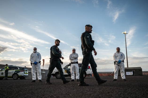 Hantavirus-hit cruise ship reaches Spanish Port of Tenerife as evacuation begins TENERIFE, SPAIN - MAY 10: Buses from Spain’s Military Emergency Unit arrive at the port of Granadilla de Abona, as personnel wearing personal protective equipment prepare for the reception operation at Granadilla Port in Tenerife, Canary Islands Spain on May 10, 2026. Cruise ship affected by a hantavirus outbreak arrived off Spain’s Tenerife Island, where passengers and crew are set to disembark and return to their home countries Andres Gutierrez Anadolu Tenerife Spain. Editorial use only. Please get in touch for any other usage.  Copyright: x2026xAnadoluxAndresxGutierrezx