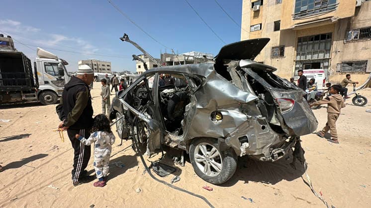 Israeli Strike in Khan Younis May 10 Residents inspect a damaged Hyundai Tucson vehicle following an Israeli strike opposite the Ihmar Association in the Al-Amal neighbourhood of Khan Younis in the southern Gaza Strip on May 10, 2026. According to Palestinian sources, the strike targeted the vehicle near a junction in the area, killing two people and wounding several others. Khan Yunis Gaza Strip Palestinian Territories Copyright: xDoaaxAlbazx