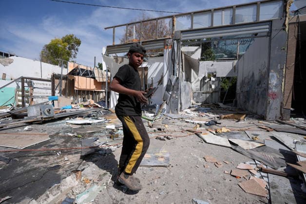 Palestinian shop owners face demolition orders in east Jerusalem JERUSALEM - MAY 10: Palestinian shop owners demolish their own businesses after Israeli authorities issued demolition and evacuation orders for commercial structures in the Al-Mushtal area of Al-Eizariya in East Jerusalem, on May 10, 2026. According to the Jerusalem Governorate, around 50 Palestinian-owned shops and commercial facilities were targeted, while Israeli security forces were deployed in the area. Issam Rimawi Anadolu Jerusalem Israel. Editorial use only. Please get in touch for any other usage.  Copyright: x2026xAnadoluxIssamxRimawix