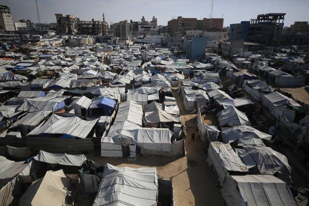 Displaced Palestinians shelter in overcrowded camps west of Gaza City General views show tents sheltering displaced Palestinians crowded together west of Gaza City on May 10, 2026, where thousands of residents live under difficult humanitarian conditions amid shortages of basic services. Many Palestinians continue to flee to densely populated areas across the Gaza Strip as the war continues, while humanitarian organizations warn of worsening living conditions and shortages of food, water and medical care in shelters and displacement camps. Photo by Omar Ashtawy apaimages Gaza city Gaza Strip Palestinian Territory 100526_Gaza_OSH_01(2) Copyright: xapaimagesxOmarxAshtawyx xapaimagesx