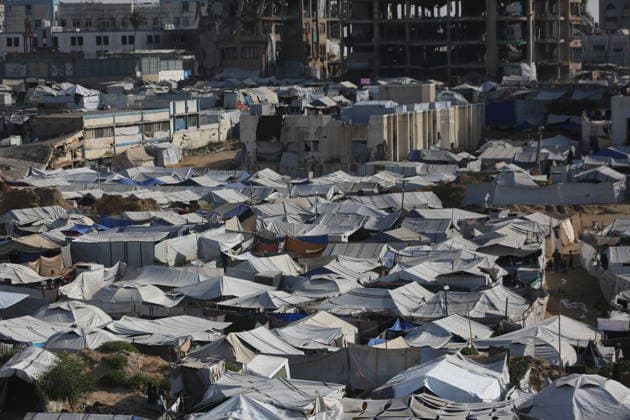 Displaced Palestinians shelter in overcrowded camps west of Gaza City General views show tents sheltering displaced Palestinians crowded together west of Gaza City on May 10, 2026, where thousands of residents live under difficult humanitarian conditions amid shortages of basic services. Many Palestinians continue to flee to densely populated areas across the Gaza Strip as the war continues, while humanitarian organizations warn of worsening living conditions and shortages of food, water and medical care in shelters and displacement camps. Photo by Omar Ashtawy apaimages Gaza city Gaza Strip Palestinian Territory 100526_Gaza_OSH_01(7) Copyright: xapaimagesxOmarxAshtawyx xapaimagesx