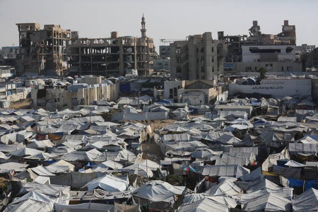 Displaced Palestinians shelter in overcrowded camps west of Gaza City General views show tents sheltering displaced Palestinians crowded together west of Gaza City on May 10, 2026, where thousands of residents live under difficult humanitarian conditions amid shortages of basic services. Many Palestinians continue to flee to densely populated areas across the Gaza Strip as the war continues, while humanitarian organizations warn of worsening living conditions and shortages of food, water and medical care in shelters and displacement camps. Photo by Omar Ashtawy apaimages Gaza city Gaza Strip Palestinian Territory 100526_Gaza_OSH_01(8) Copyright: xapaimagesxOmarxAshtawyx xapaimagesx