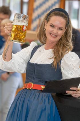 Mona Fuchs, DIE GRÜNEN, new second mayor of Munich, in a dirndl with a Maß of beer, Truderinger Festwoche, traditional Bavarian folk festival in the Trudering district of Munich, Munich, Ma