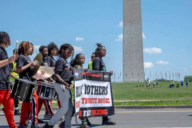 May 10, 2026, Washington, Dc, USA: Protesters walk past the Washington Monument for the Black Mothers March on MotherÃ¢â‚¬â ¢s Day. Dozens of protesters gathered at the Lincoln Memorial for the rally to demand greater protections for Black mothers and families. Washington USA - ZUMAh204 20260510_znp_h204_011 Copyright: xRileyxHartyx